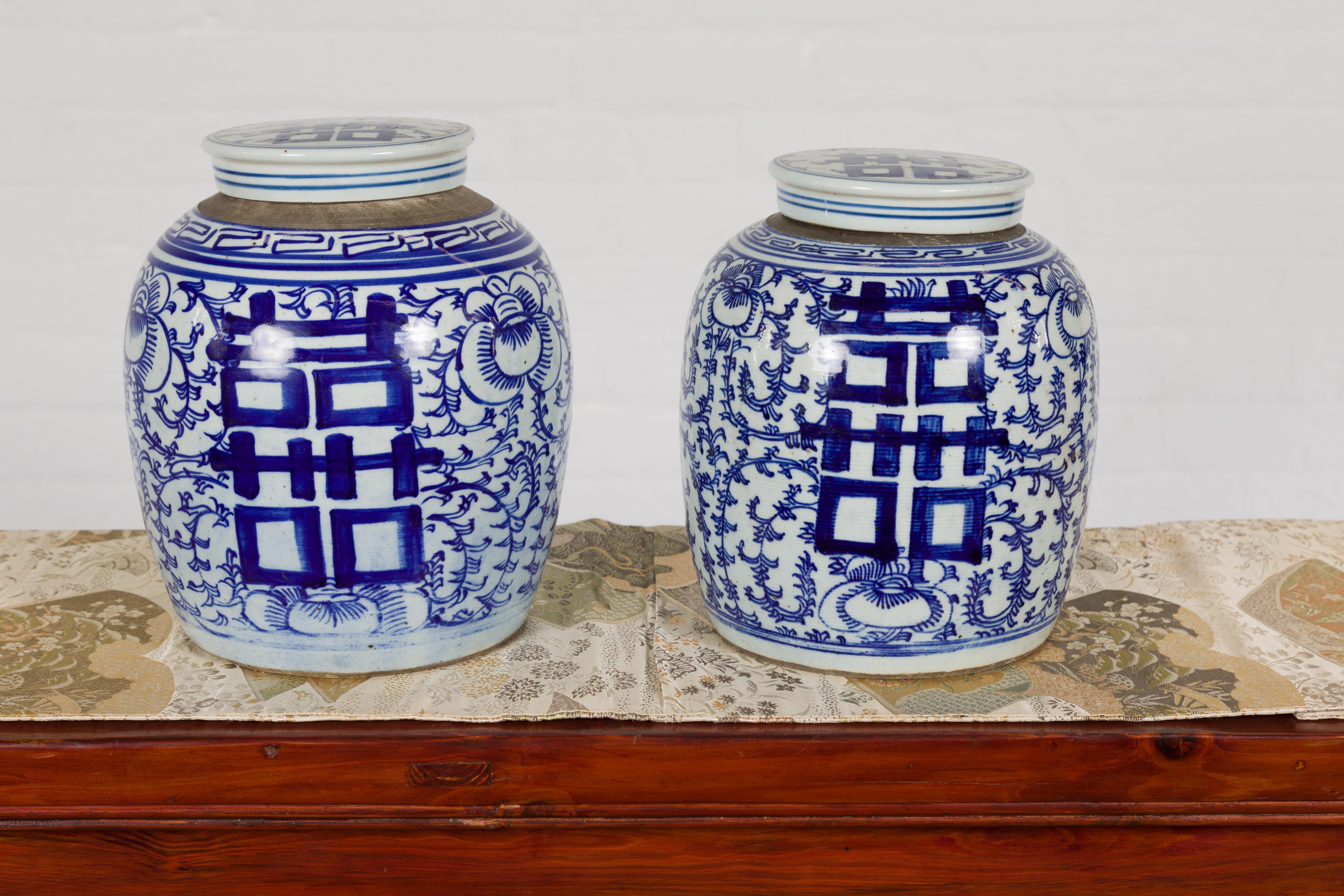Painted Near Pair of White and Blue Porcelain Double Happiness Lidded Ginger Jars For Sale