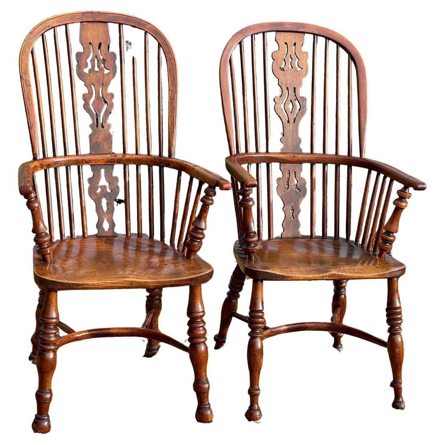 Near pair of yew wood Windsor chairs with crinoline stretchers For Sale