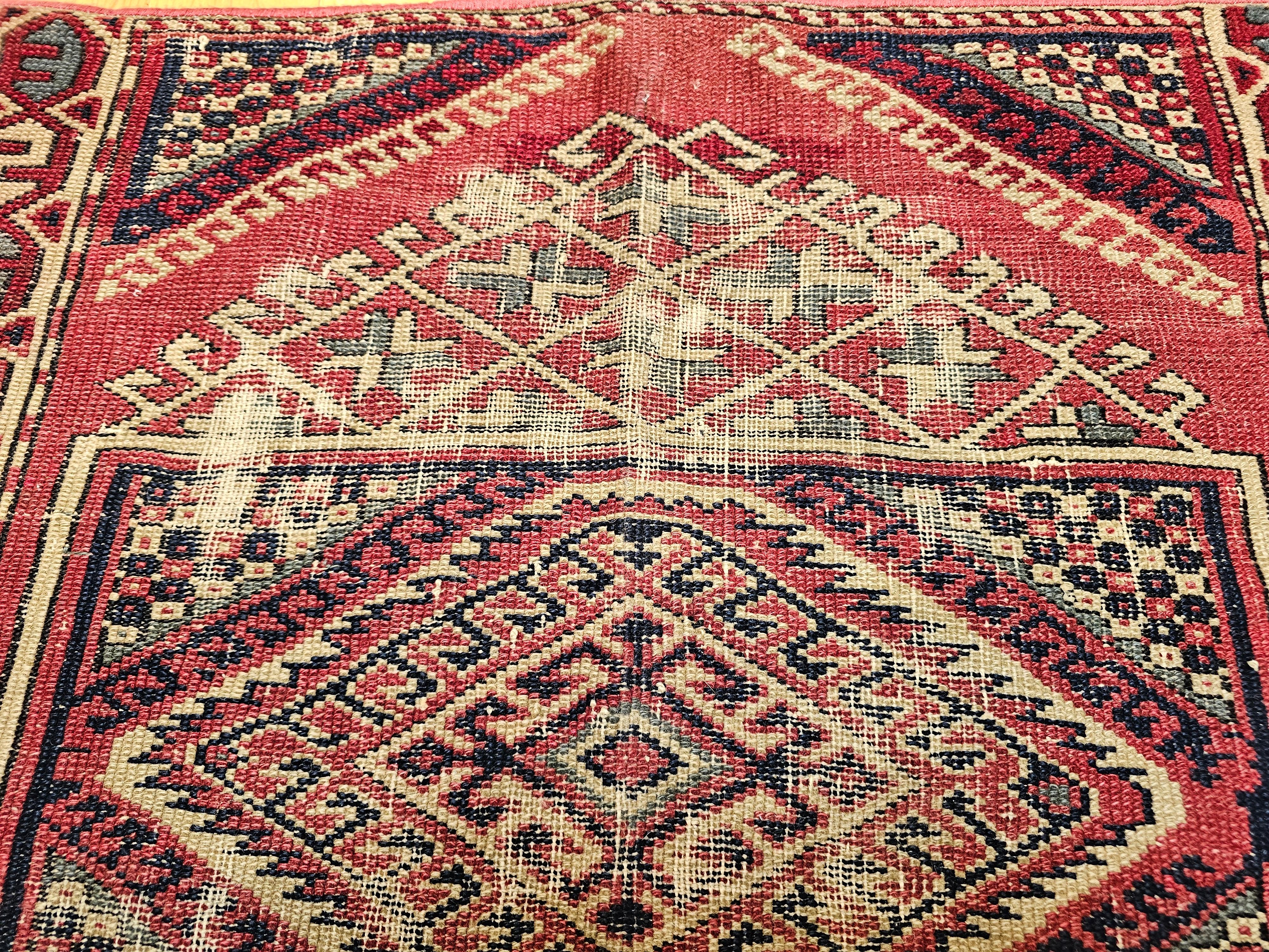 19th Century Near-Square Turkish Village Rug in Geometric Pattern in Pink, Green, Blue, Ivory For Sale