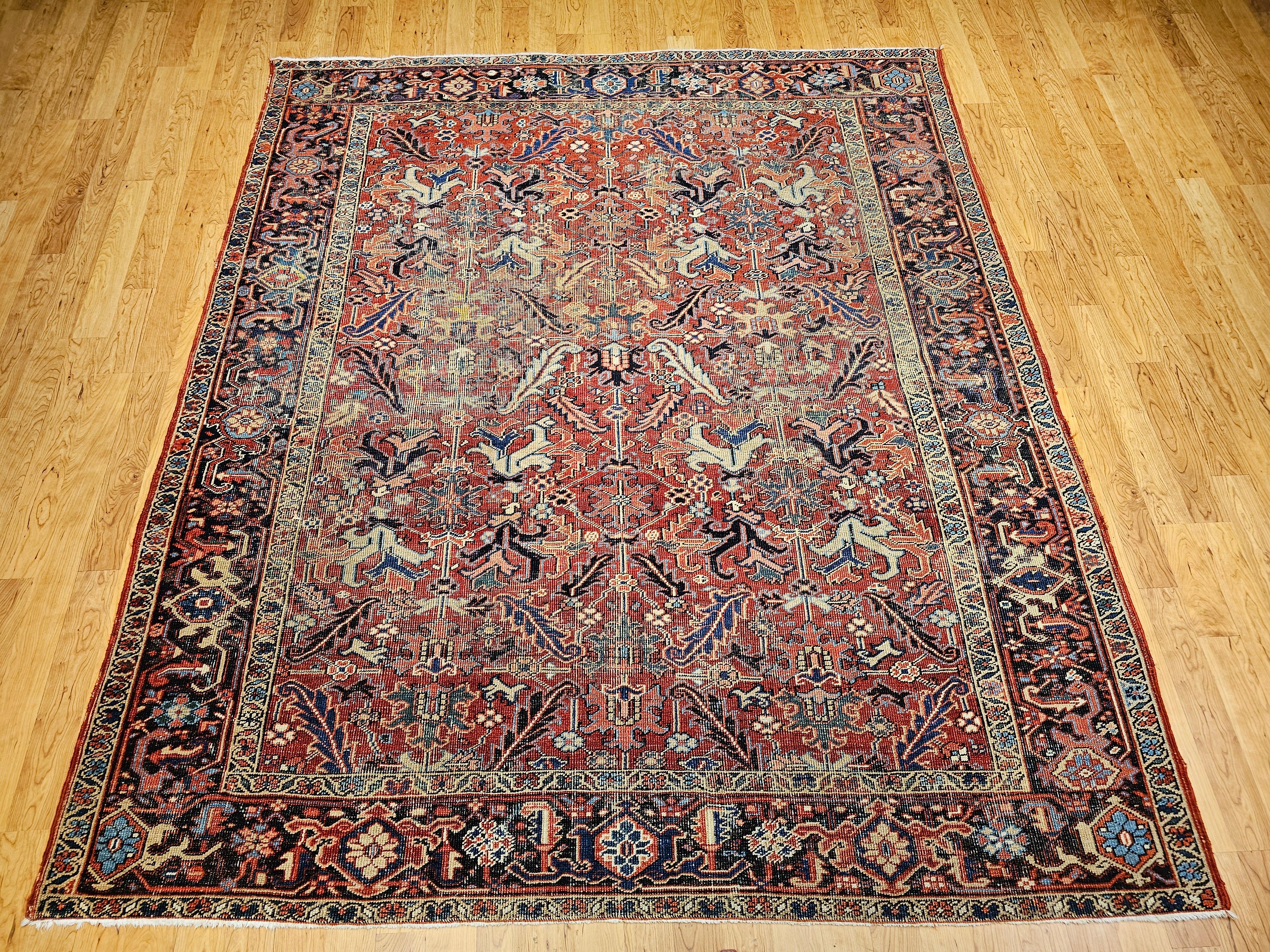 A masterful example of early 20th-century Persian craftsmanship, this rare antique Heriz Serapi rug, woven circa the early 1900s, features an uncommon near-square format with an exquisite all-over design. Celebrated for its rarity, generous