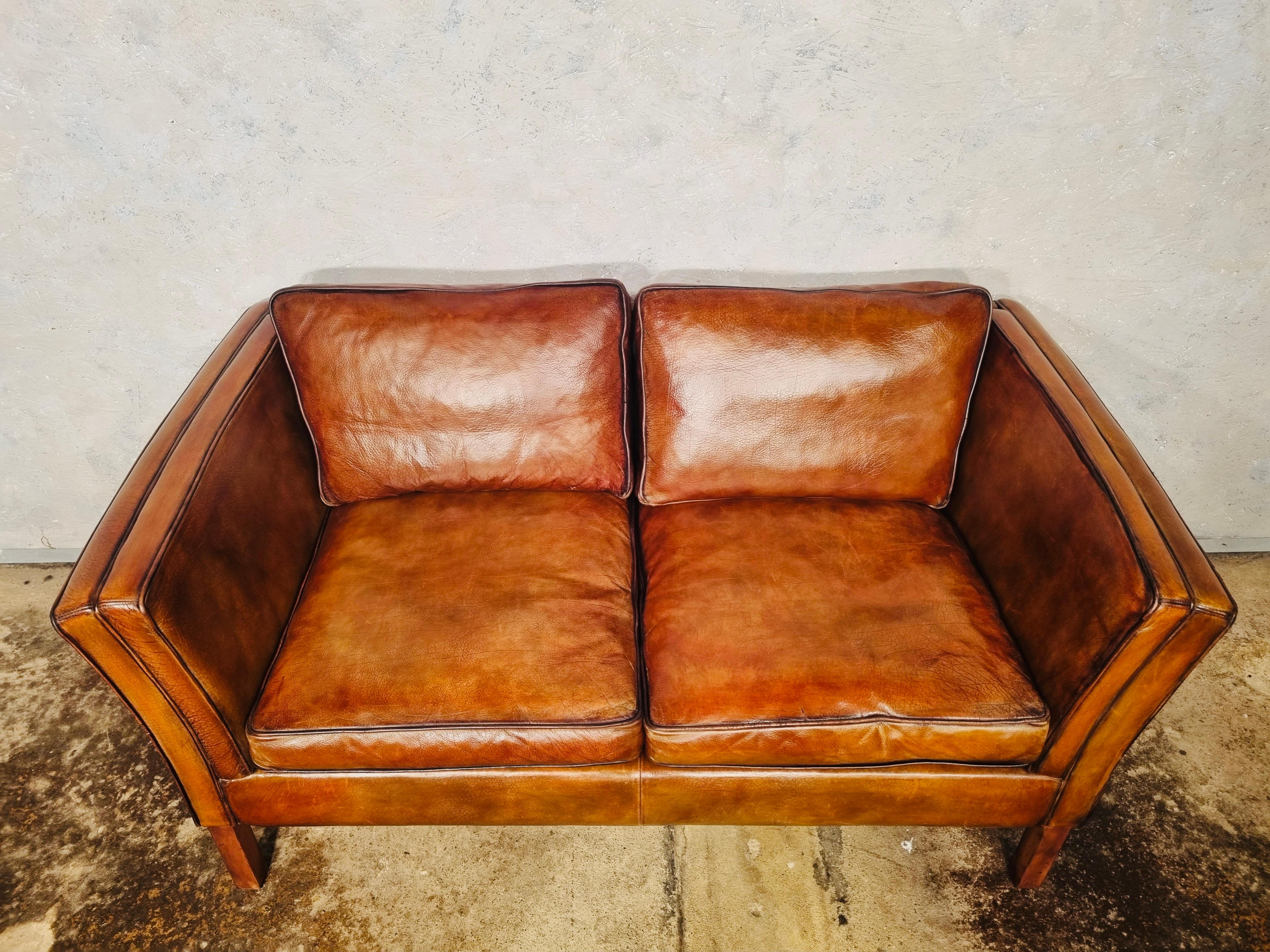 A Stylish Danish 1970s Sofa great design with beautiful lines, sits wonderfully.

Stunning hand dyed tan colour, great patina and finish.

Viewings welcome at our showroom in Lewes, East Sussex.