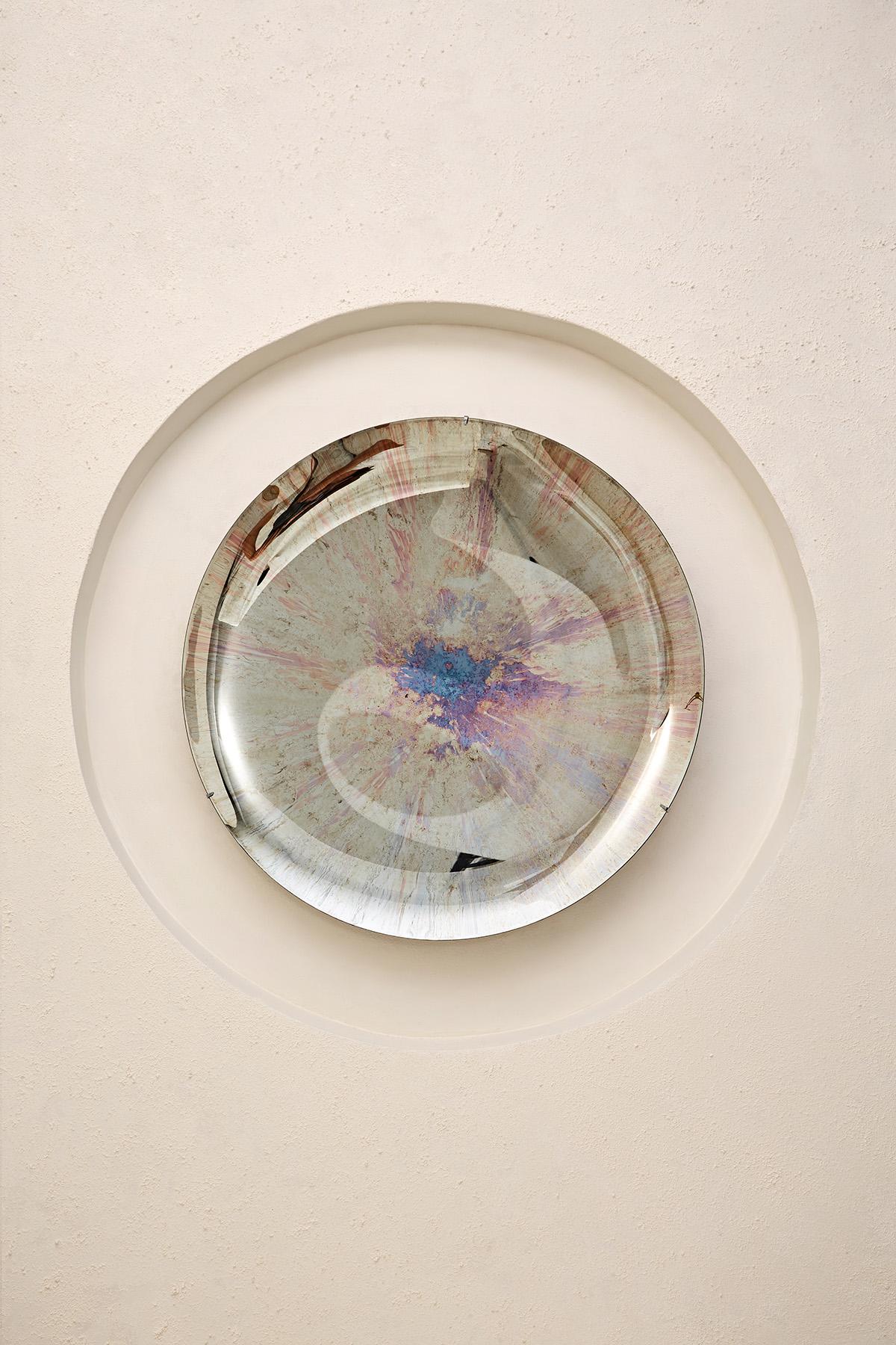 Concave Oxidized Mirror.
Ø97 cm  Depth: 7 cm  Thickness: 4 mm 
Colour: Multicolor  Hanger: Brass

The NEBULA Collection is a celestial celebration inspired by the ethereal beauty and mystery of cosmic clouds. The collection is a blend of elements