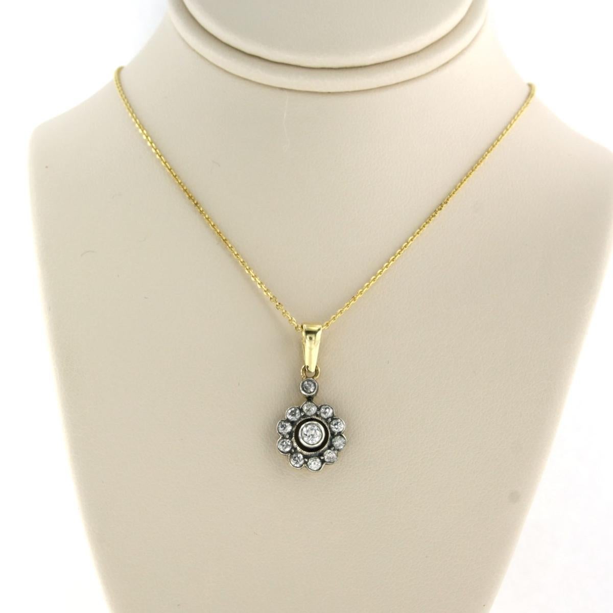 14k yellow gold necklace with a gold and silver pendant with old mine cut diamonds. 0.70ct - 45cm long

detailed description:

the length of the necklace is 45 cm long and 0.8 mm wide

the size of the pendant is 2.2 cm long by 1.1 cm wide

weight