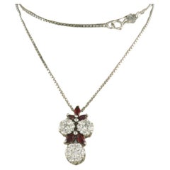 Neckalce and pendant set with garnet and diamonds up to 1.10ct 18k white gold