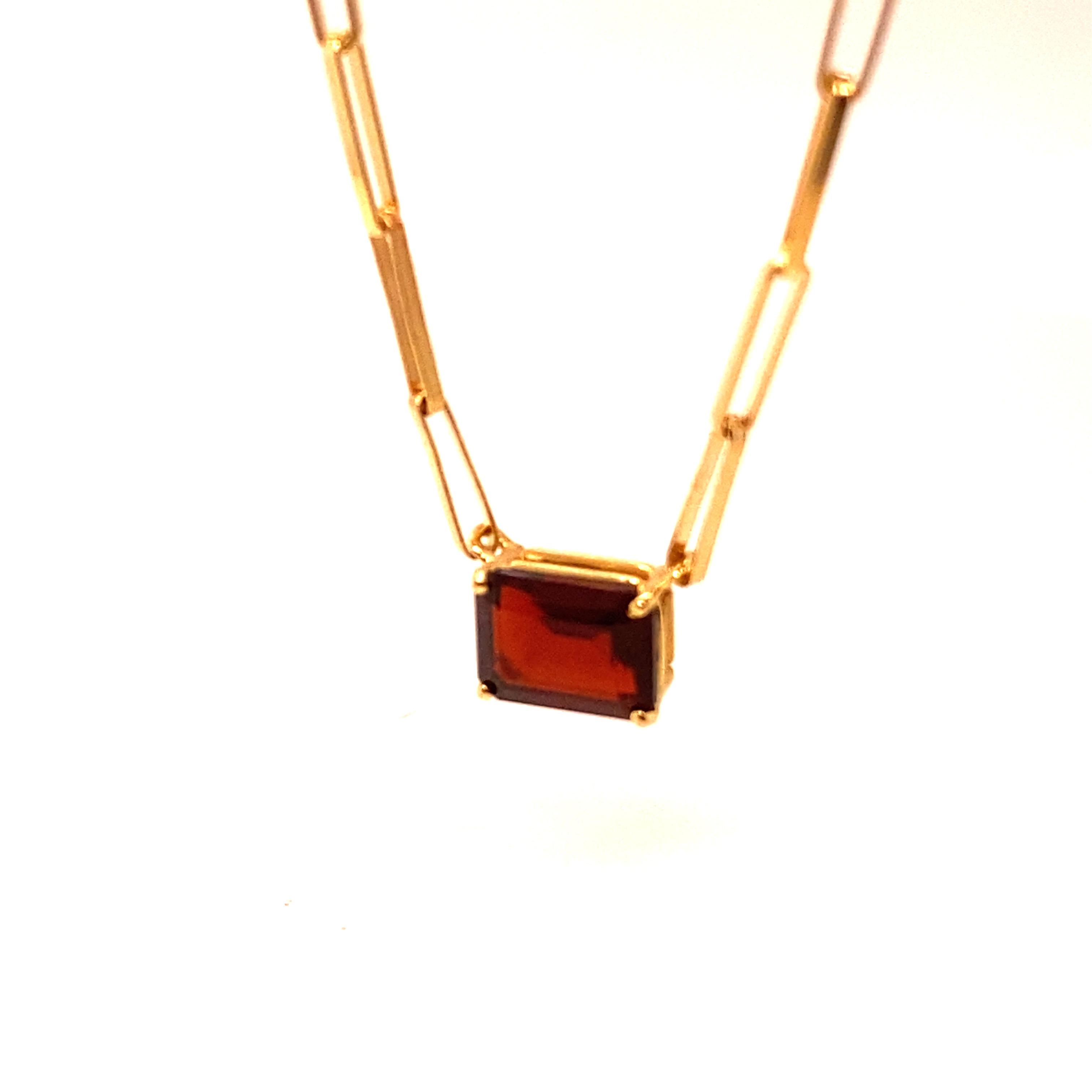 Emerald Cut Straight Mech with Garnet size RPC Necklace Yellow Gold 18 Karat For Sale