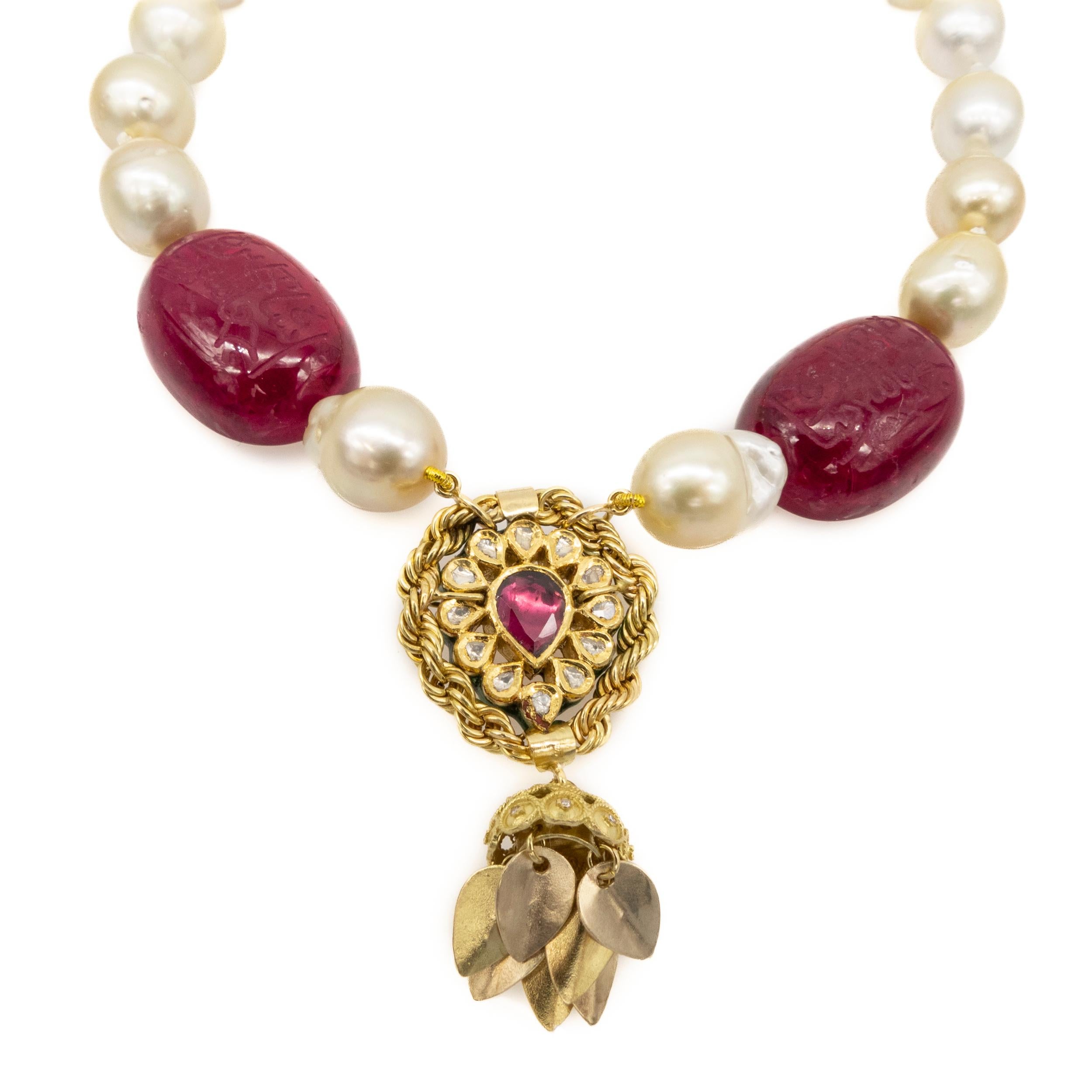 Necklace 18 Karat Gold Rubellite Natural Pearl Diamonds Enamel

Necklace in 18k yellow gold, natural pearls, reconstituted rubellites engraved with Arabic calligraphy glyptic and antique Mughal gold piece.

Introducing our stunning 18 karat yellow