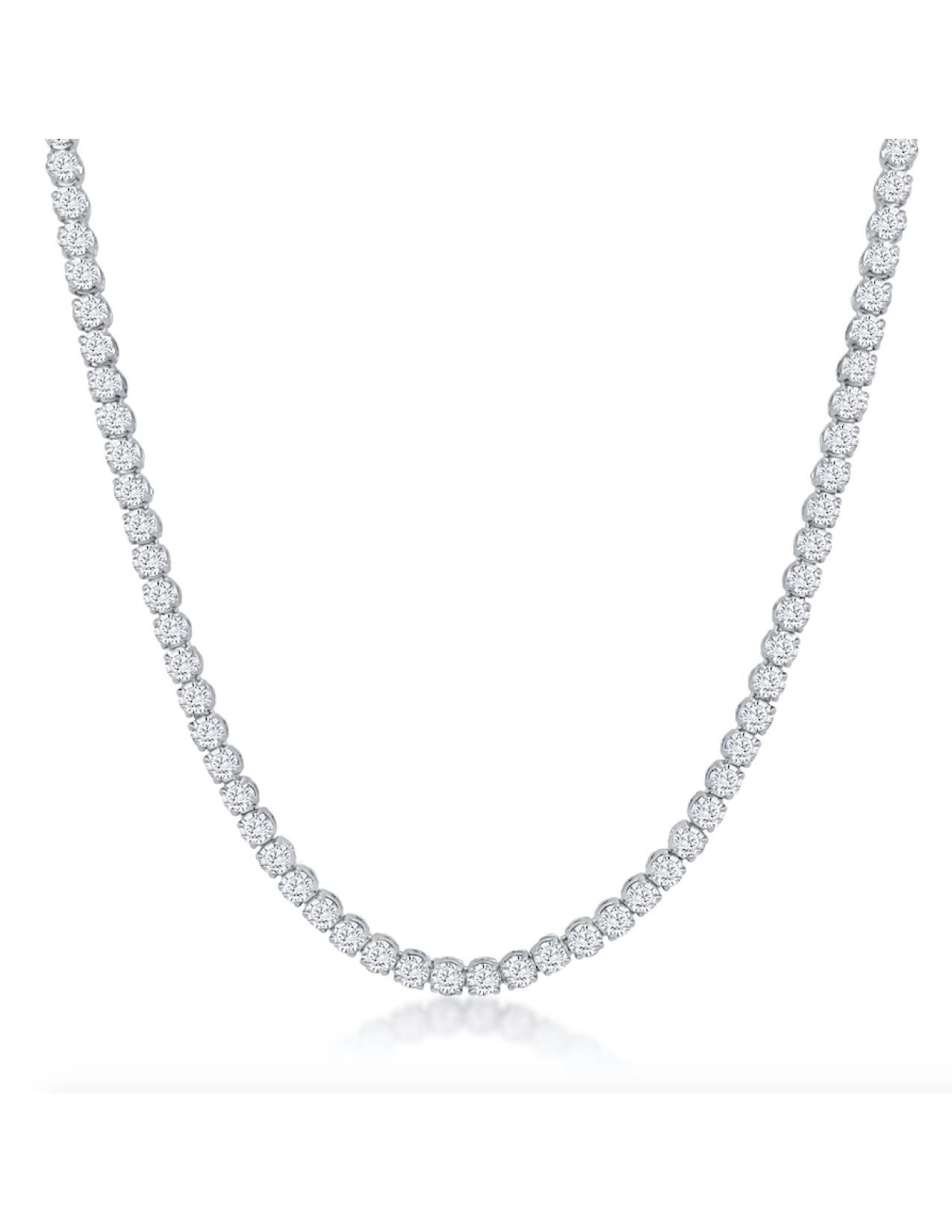18kt white gold tennis necklace with 117 round diamonds totaling 15.06 carats, clarity VS, Color G, and measuring 16 inches in length. This luxurious and timeless necklace is an ideal high jewelry gift for a mom, girlfriend, or daughter, perfect for