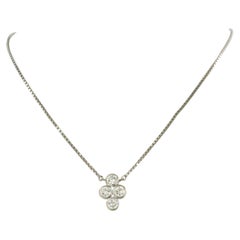 Brilliante e ciondolo con diamanti taglio brillante fino a 0,65ct in oro 14k 3,5 grammi
