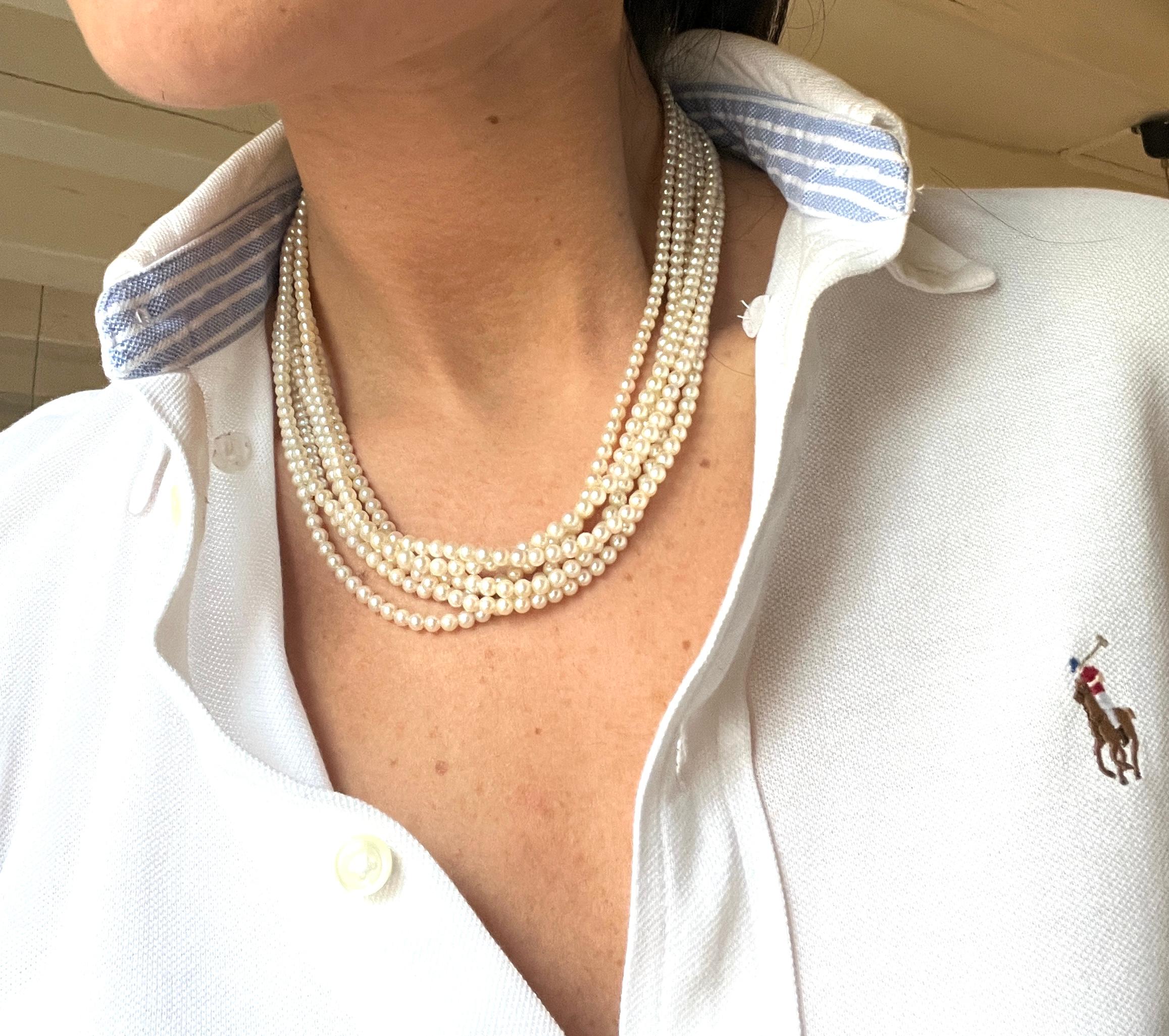 Necklaces Akoya Pearls Yellow Gold  White Gold 18 Carat
This necklace features six strands of Akoya pearls, each measuring 4.7 mm in diameter, creating a voluminous yet delicate effect. The clasp is all in yellow gold and balnc, and is securely