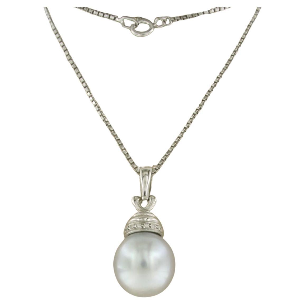 Necklace an d pendant set with pearl and diamonds 18k white gold