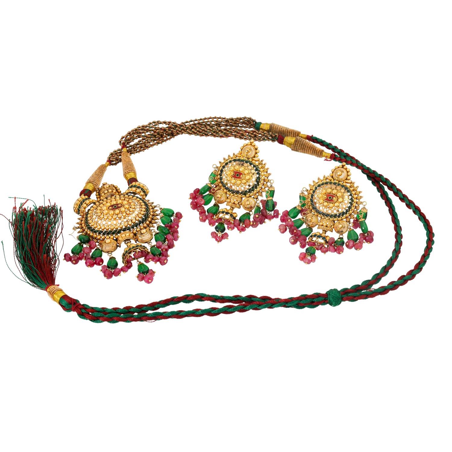 with rubies and green glass, 14K yellow gold, finely gold-plated, partly enamelled, pendant approx. 5x7 cm on a textile strap, earrings L: approx. 5 cm, gold weight approx. 30 g, probably Asia 20th/21st Century, slight signs of wear.

 Set necklace