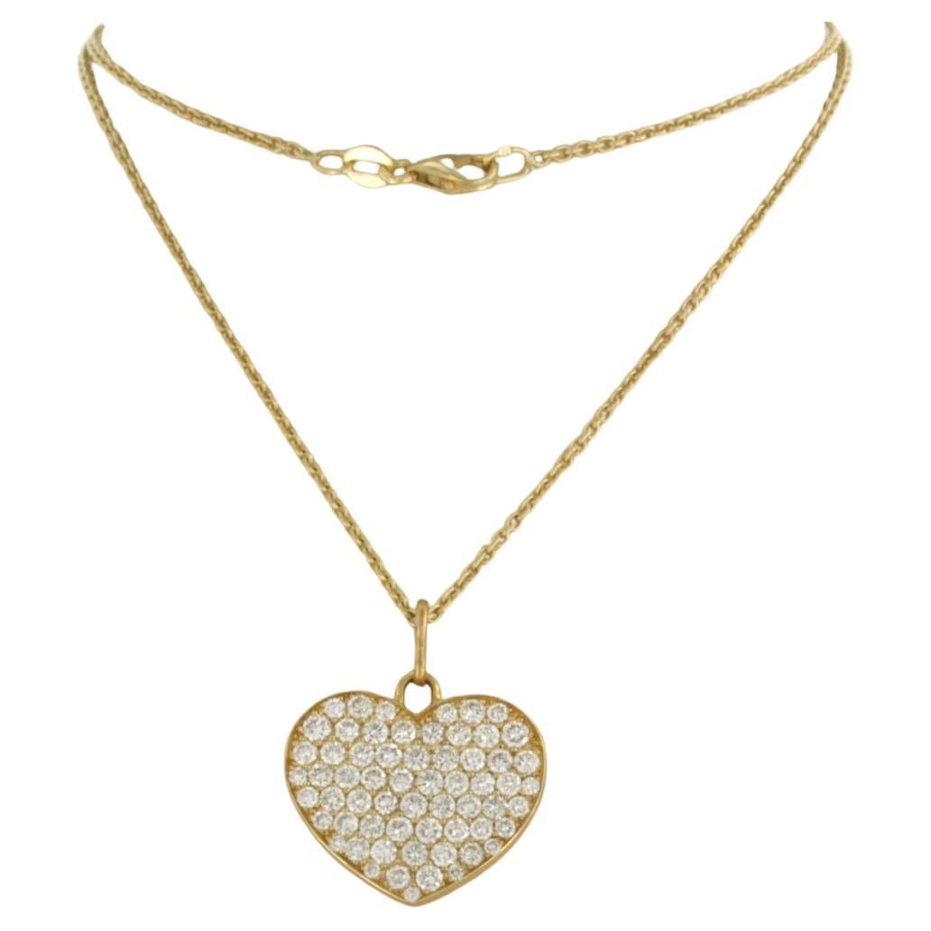 Necklace and hartshaped pendant with brilliant cut diamonds 1.50ct 18k gold