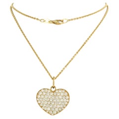 Necklace and hartshaped pendant with brilliant cut diamonds 1.50ct 18k gold
