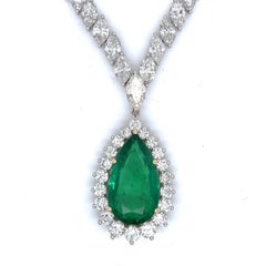 Necklace and Pendant - 14.12 Carat Pear-Shape Emerald and 37.68 CTW Diamonds.