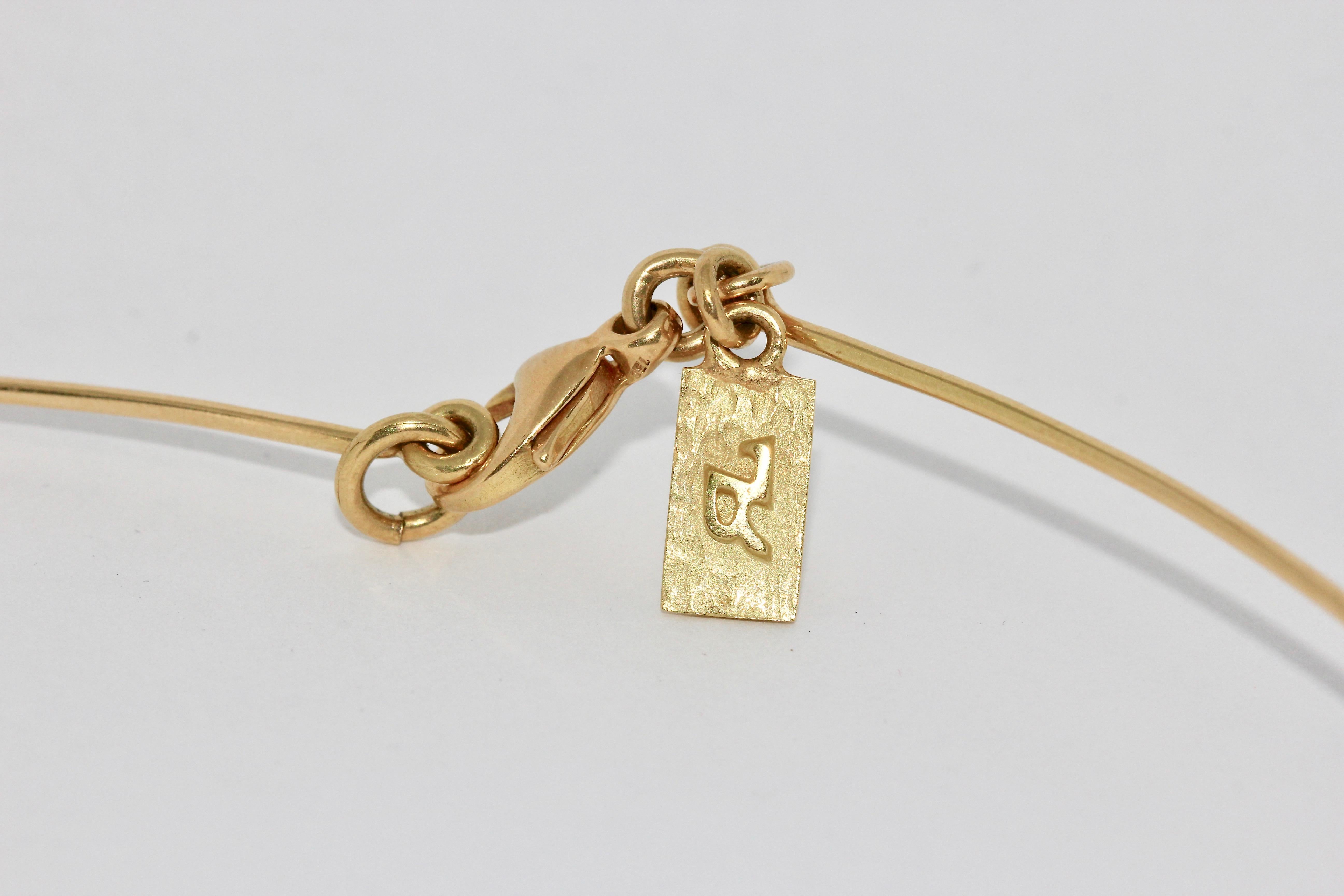 Collana e ciondolo a forma di 