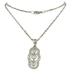 Collier et pendentif diamants taille brillant jusqu'à 0,89ct or 18k 10,3 grammes