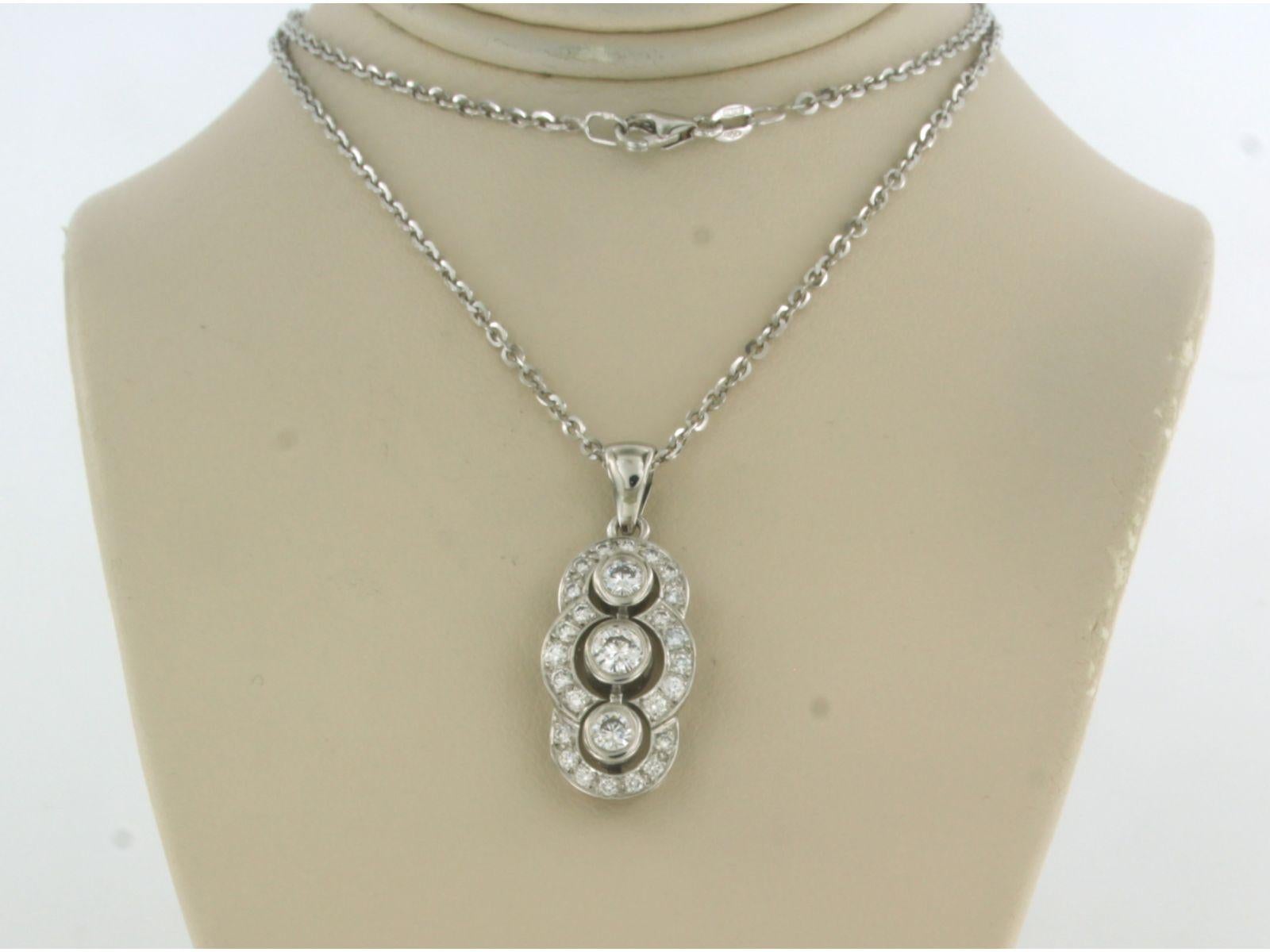 18k white gold necklace with pendant set with brilliant cut diamonds total approx.  0.89ct - F/G - VS/SI - 45cm

Detailed description

the length of the necklace is 45 cm long by 1.8 mm wide

Dimensions of the pendant are 2.5 cm high by 1.2 cm