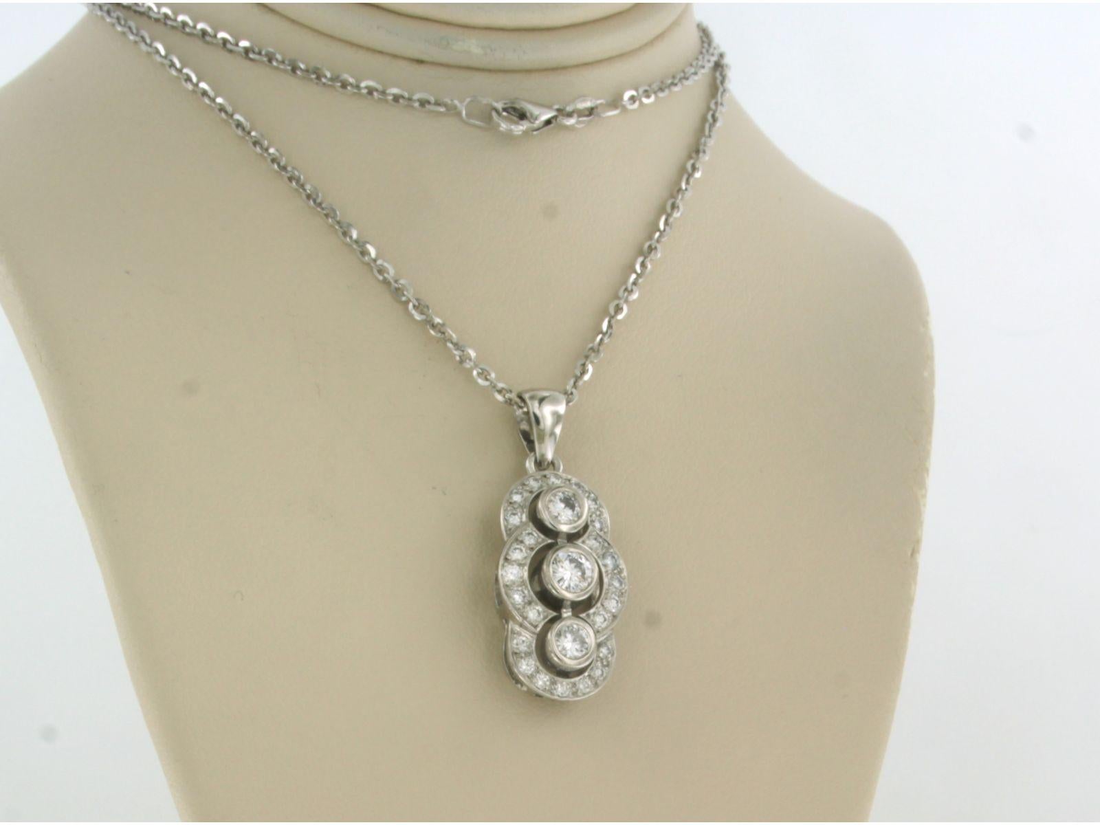 18k white gold necklace with pendant set with brilliant cut diamonds total approx.  0.89ct - F/G - VS/SI - 45cm

Detailed description

the length of the necklace is 45 cm long by 1.8 mm wide

Dimensions of the pendant are 2.5 cm high by 1.2 cm