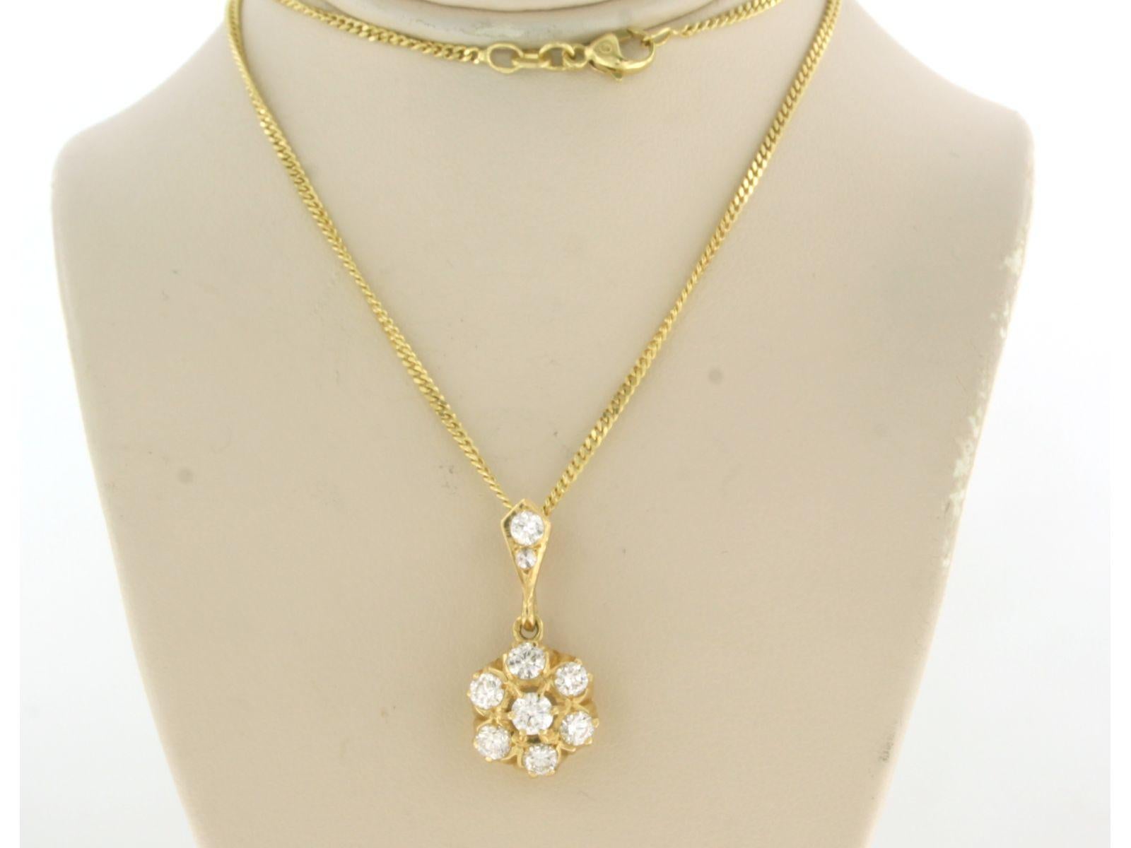14k yellow gold necklace with an 18k yellow gold entourage pendant set with brilliant and single cut diamonds. 1.28ct - F/G - VS/SI - 45 cm long

detailed description

necklace is 45 cm long and 1.0 mm wide

size of the pendant is approximately 2.9