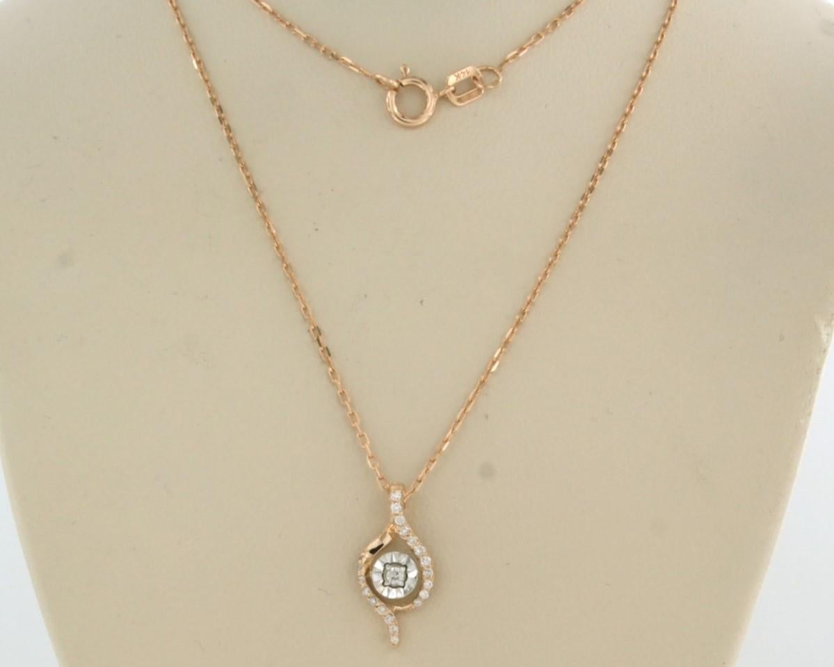 14k rose gold necklace with bicolour gold pendant set with brilliant cut diamonds. 0.10ct - F/G - SI - 45 cm long

detailed description:

the necklace is 45 cm long and 0.7 mm wide

the pendant is 1.5 cm high and 7.4 mm wide

weight 1.9