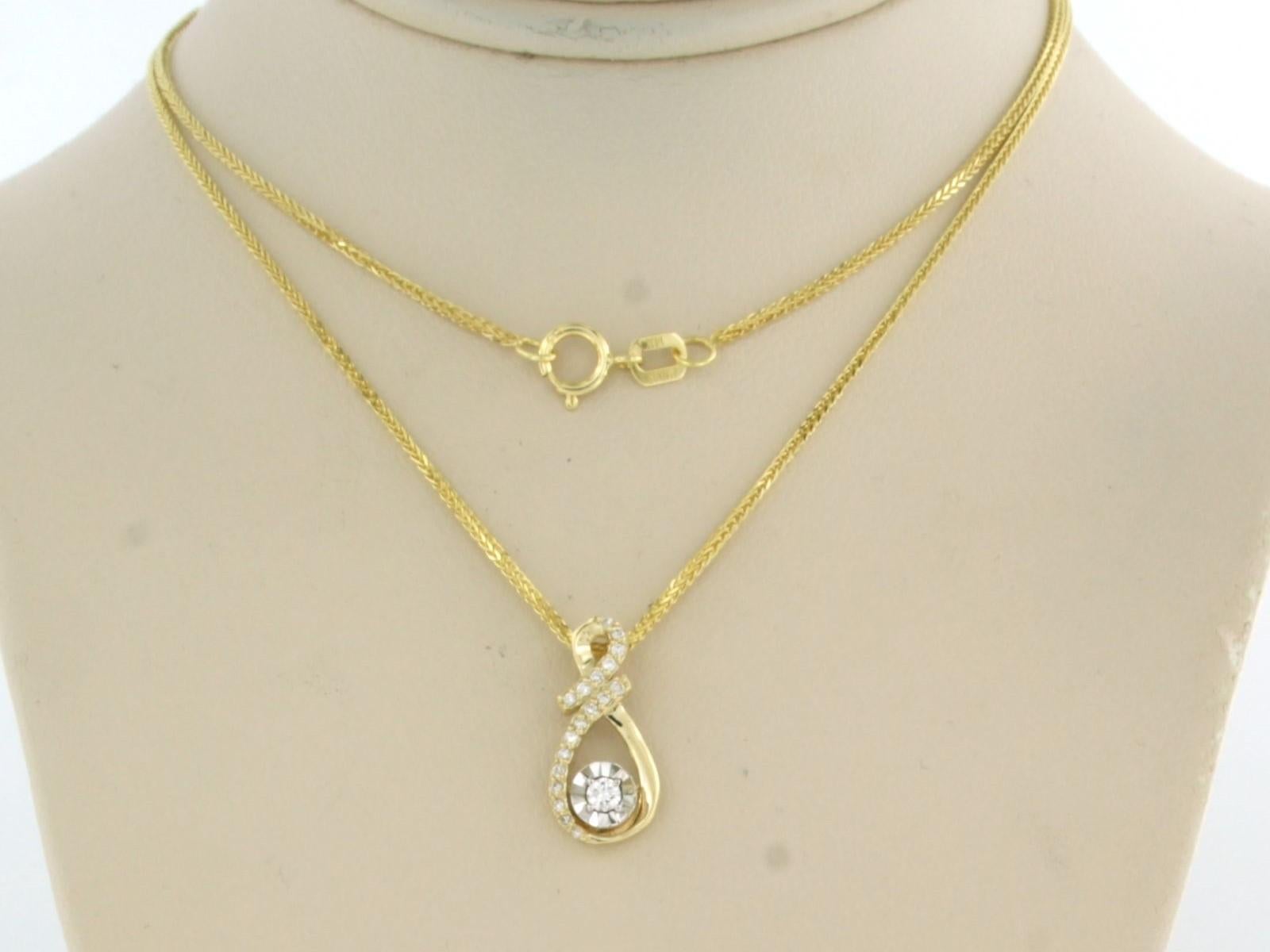 14k yellow gold necklace with bicolour gold pendant set with brilliant cut diamonds up to . 0.10ct - F/G - VS/SI - 45 cm long

detailed description

necklace is 45 cm long and 0.7 mm wide

size of the pendant is approximately 1.5 cm high by 7.5 mm