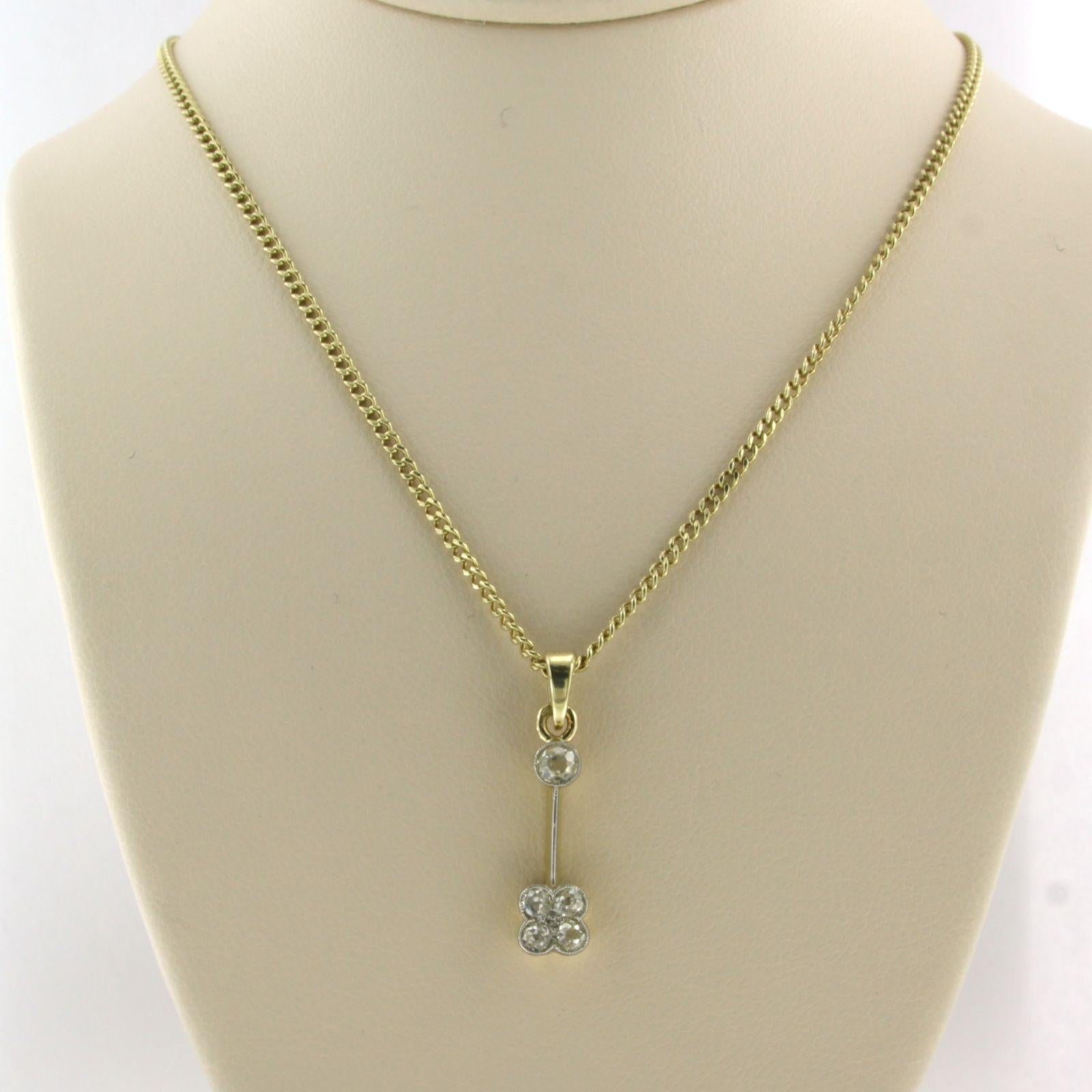 14k yellow gold necklace with a bicolor gold pendant set with old mine cut diamonds. 0.30ct - F/G - SI - 50 cm long

detailed description

the length of the necklace is 50 cm by 1.5 mm wide

size of the pendant 2.3 cm x 0.6 cm wide

weight 5.7