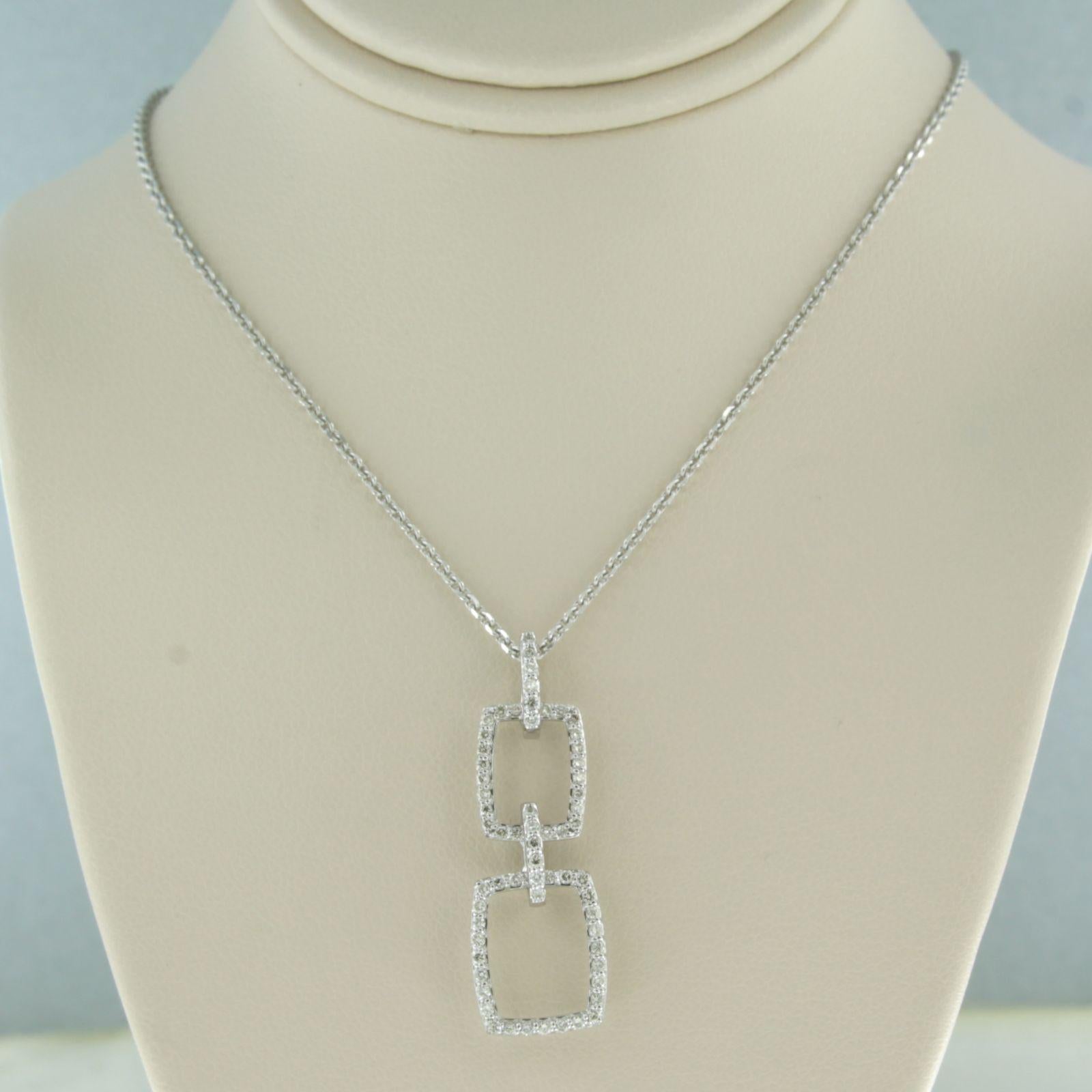 Collier et pendentif en or blanc 18k sertis de diamants taille brillant jusqu'à. 0.38ct - F/G - VS/SI - longueur 40 cm

description détaillée :

Le collier mesure 40 cm de long et 0,8 mm de large.

le pendentif mesure environ 3,3 cm sur 1,1 cm de
