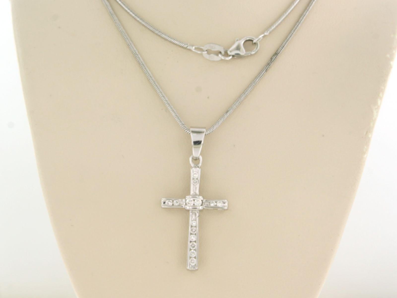14k white gold necklace with cross pendant set with brilliant cut diamond 0.20 ct F/G - VS/SI - 50 cm

detailed description:

the length of the necklace is 50 cm long by 1.0 mm wide

the size of the pendant is 3.3 cm by 1.6 mm wide

Total weight 8.4