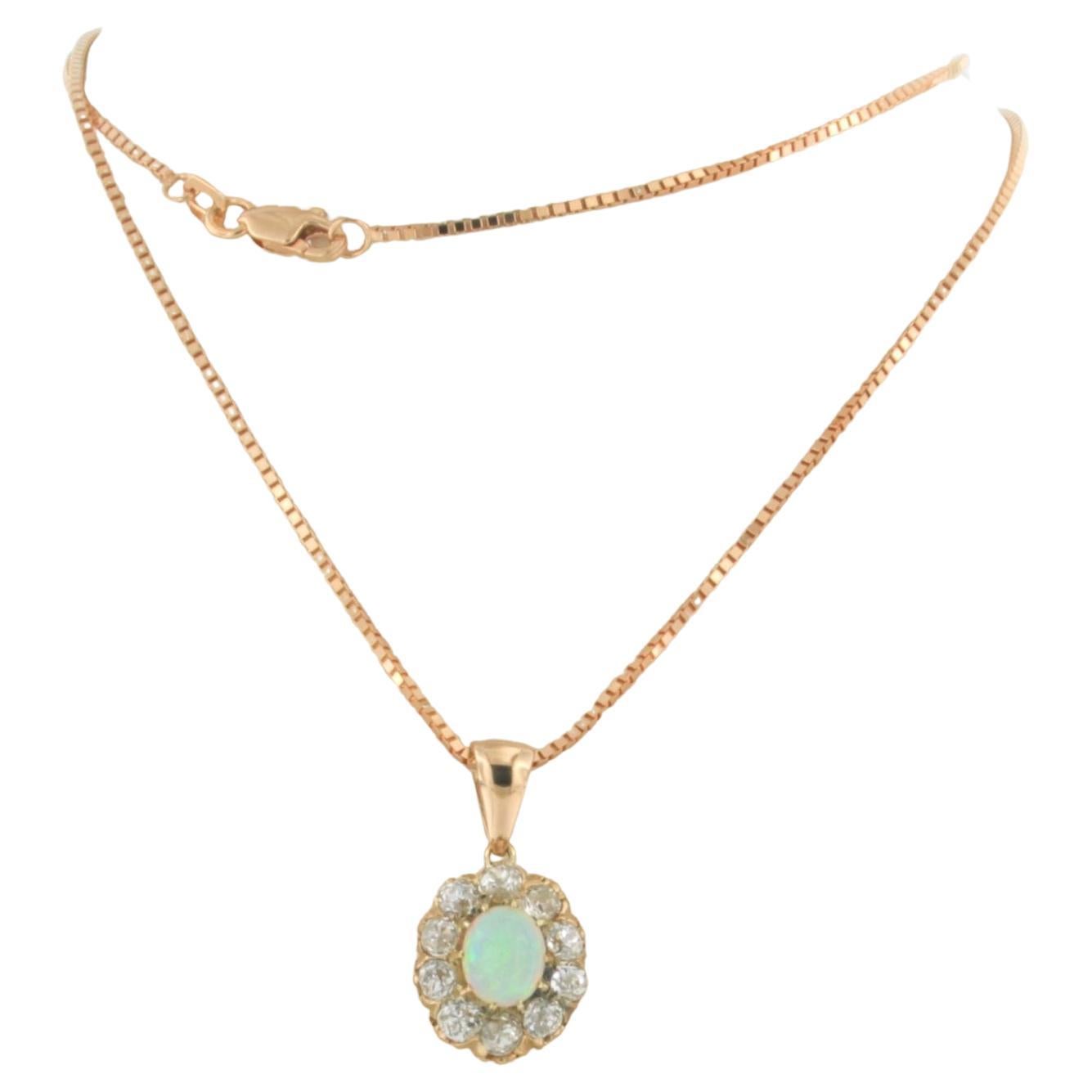 Necklace and pendant set with opal an diamonds 14k pink gold