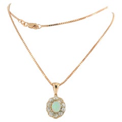 Necklace and pendant set with opal an diamonds 14k pink gold
