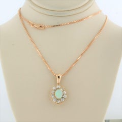 Necklace and pendant set with opal and old mine cut diamonds 14k pink gold