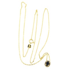 Necklace and pendant set with sapphire and diamonds 14k yellow gold