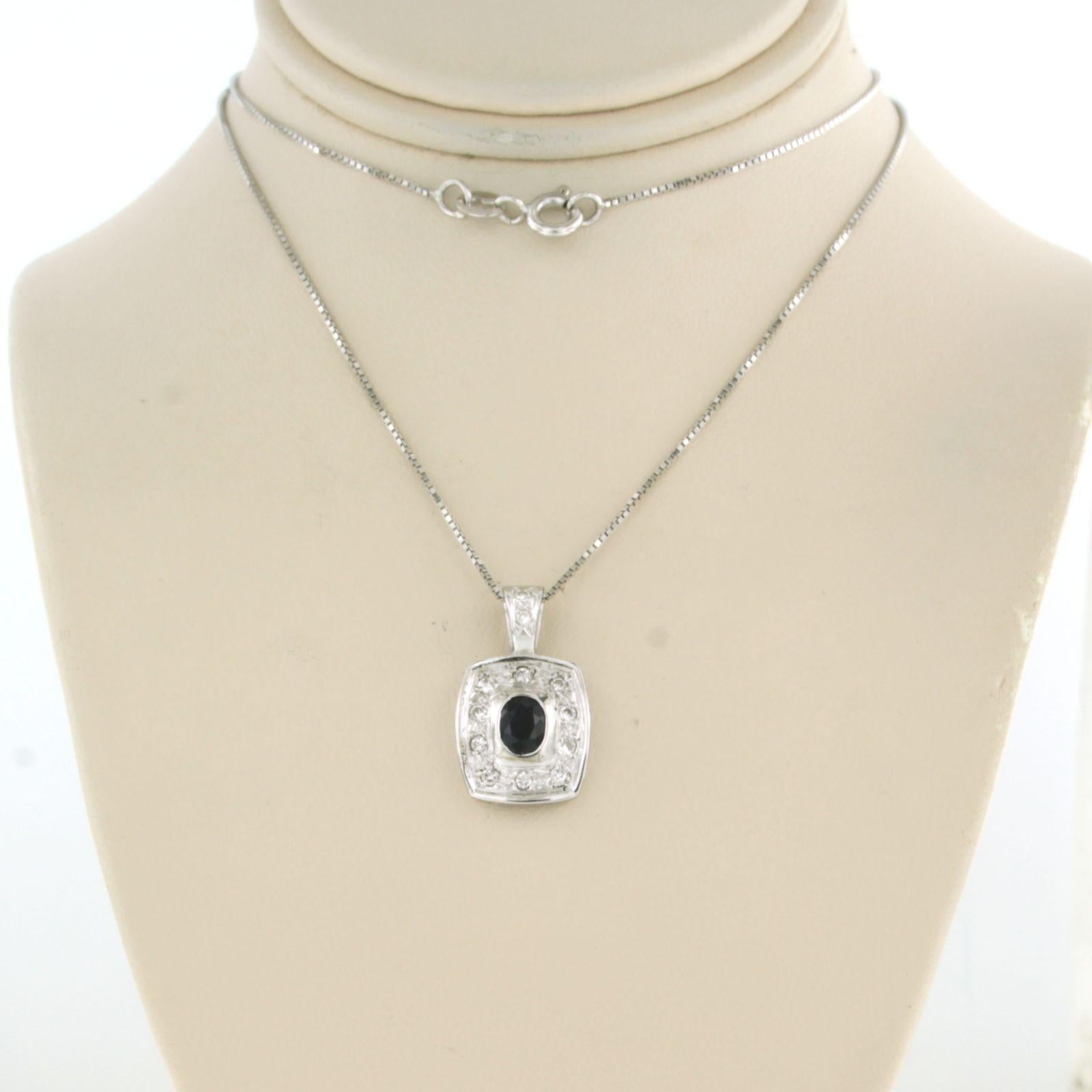 18k white gold necklace and pendant set with sapphire and brilliant cut diamonds. 0.24ct - F/G - SI - 45 cm long

detailed description:

necklace is 45 cm long and 0.7 mm wide

size of the pendant is approximately 1.9 cm long by 1.1 cm wide

total