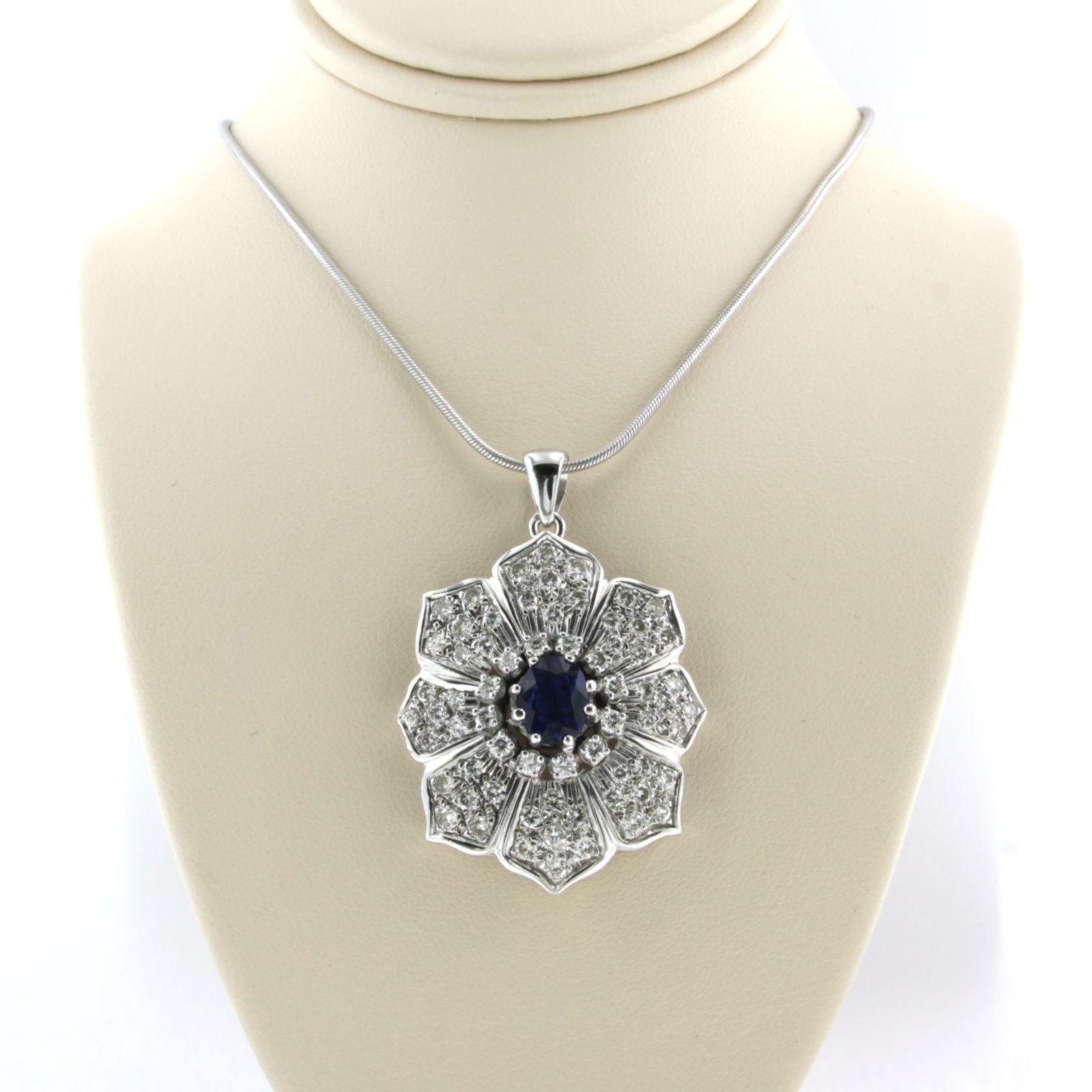 14k white gold necklace with pendant set with sapphire totaling approximately 1.45ct and brilliant cut diamond totaling approximately 2.00ct - F/G - VS/SI - 50 cm long

detailed description:

the necklace is 50 cm long and 1.1 mm wide

the pendant
