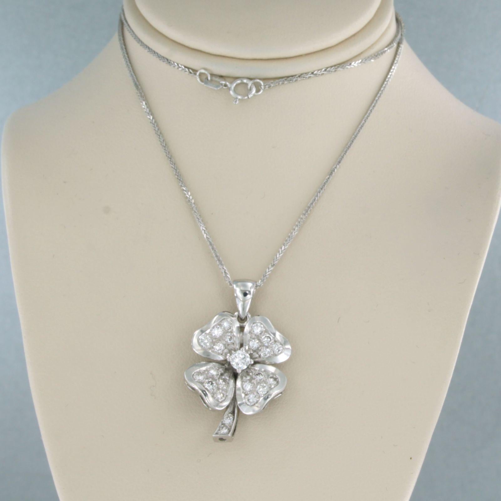 14k white gold necklace with an 18k white gold pendant set with brilliant cut diamonds up to. 0.75ct - F/G - VS/SI - 40 cm long

detailed description

the necklace is 40 cm long and 0.7 mm wide

size of the pendant is approximately 2.9 cm by 1.8
