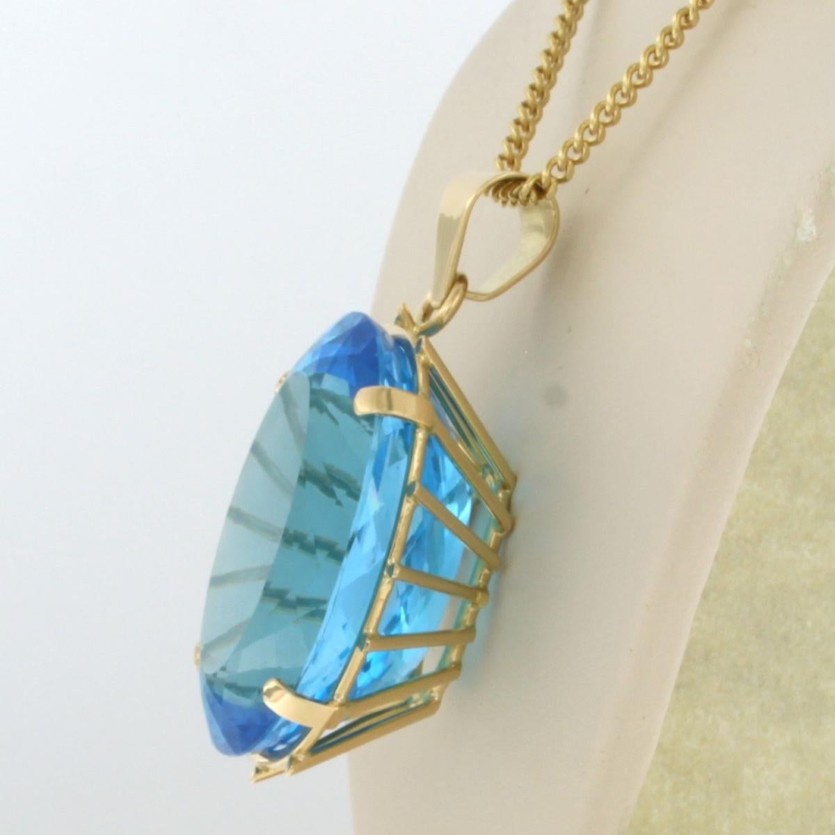 Modern Necklace and pendant with blue topaz up to 100ct 18k yellow gold For Sale
