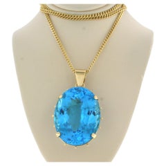 Necklace and pendant with blue topaz up to 100ct 18k yellow gold