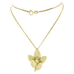 Brilliante e pendente con diamanti taglio brillante fino a 0,20ct in oro giallo 14k