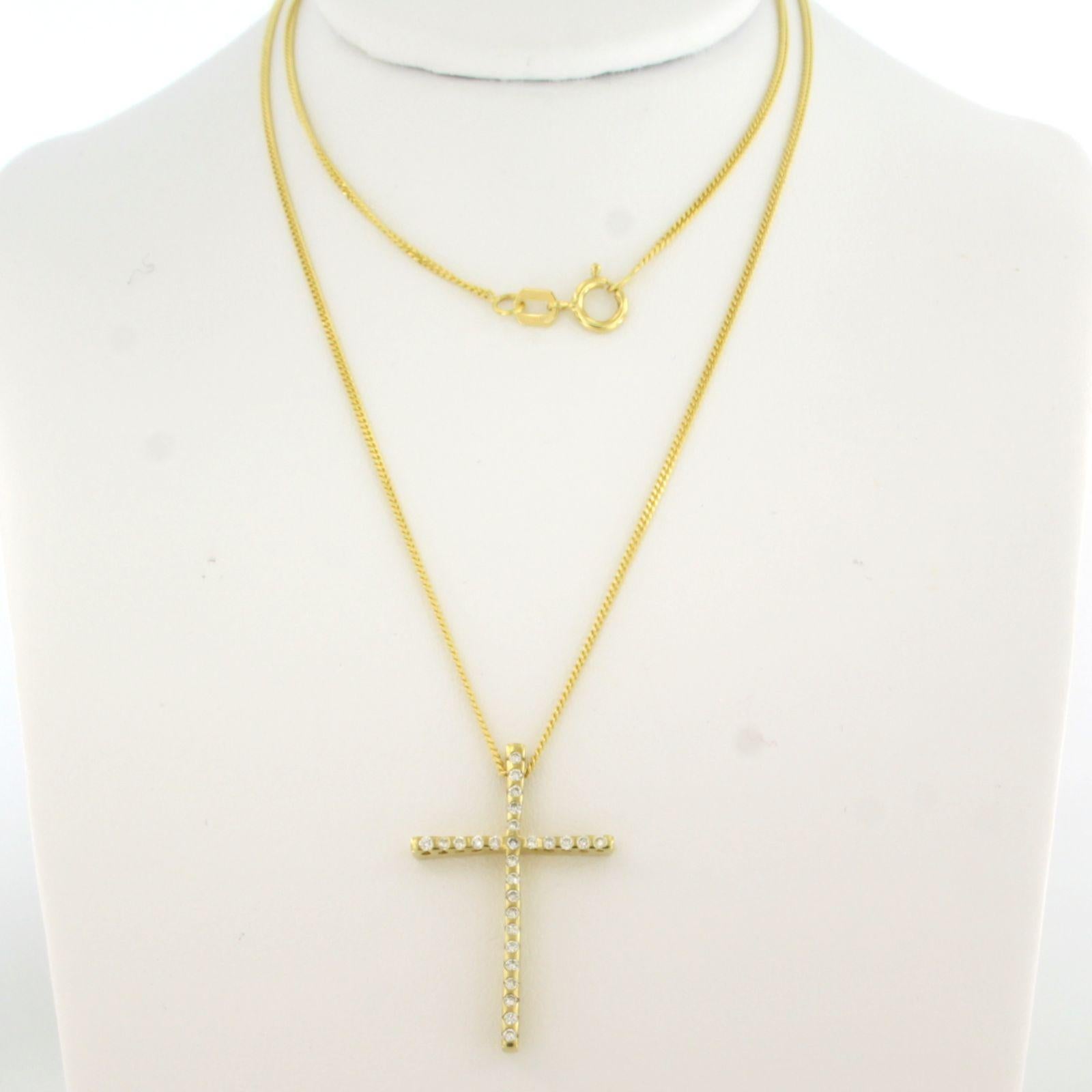 14k yellow gold necklace with cross pendant set with brilliant cut diamonds up to 0.27ct - F/G - VS/SI - 45 cm long

Detailed description:

necklace is 45 cm long, and 1.0 mm wide

dimensions of the pendant are 2.7 cm long by 1.8 cm wide

total
