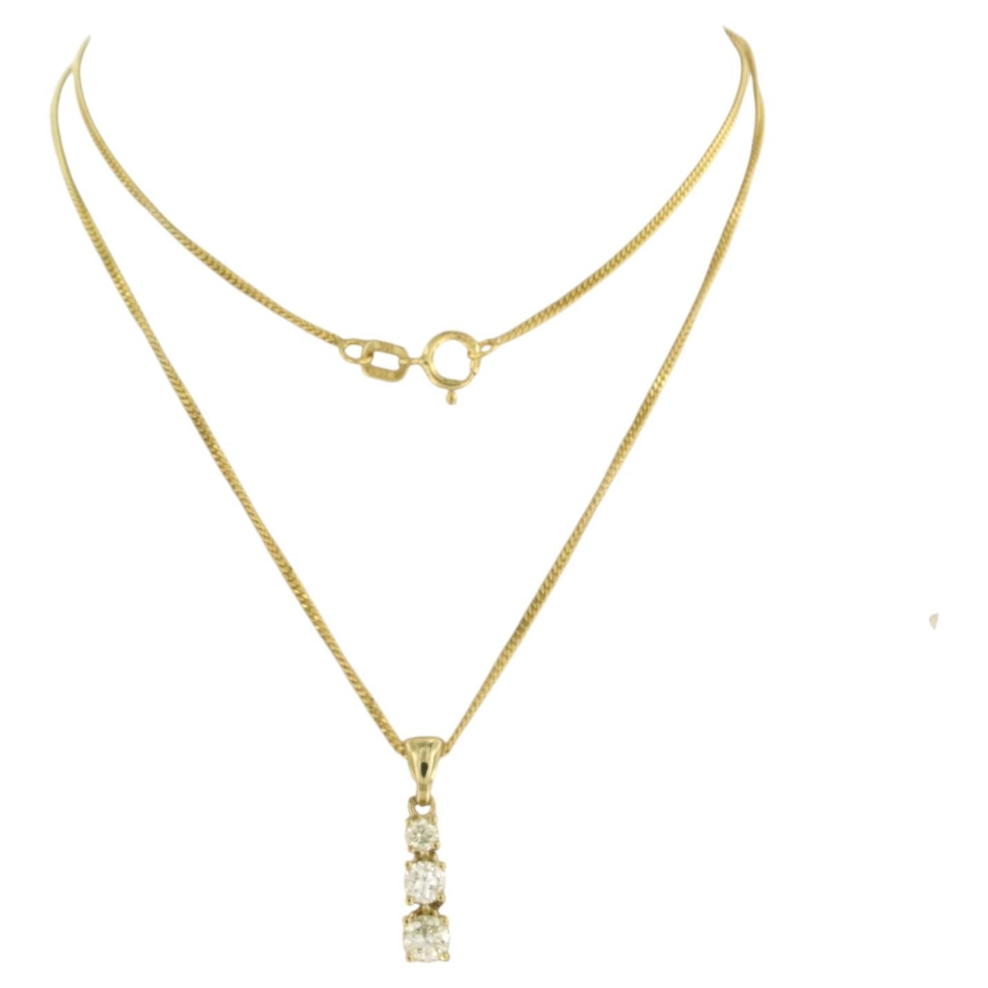 Brilliante e ciondolo con diamanti taglio brillante fino a 0,40ct in oro 14k 2,9 grammi