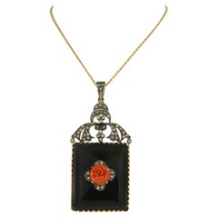 Necklace and pendant with coral, onyx and brilliant cut diamonds 18k gold