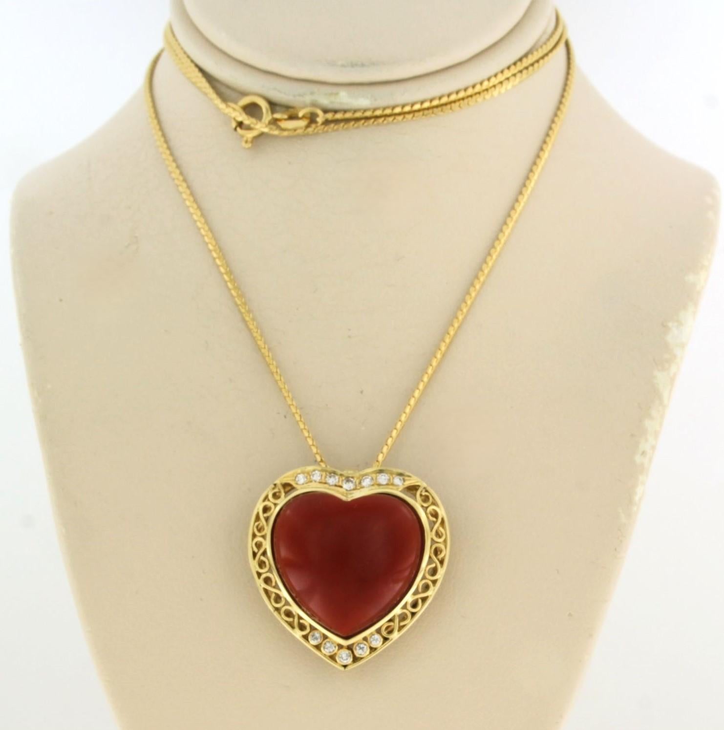 18k yellow gold necklace with pendant set with a heartshape Corallium Rubrum and brilliant cut diamonds 0.20ct - F/G - VS/SI - 60 cm long

detailed description:

necklace is 60 cm long by 1.3 mm wide

dimensions of the pendant are 2.6 cm long by 2.6
