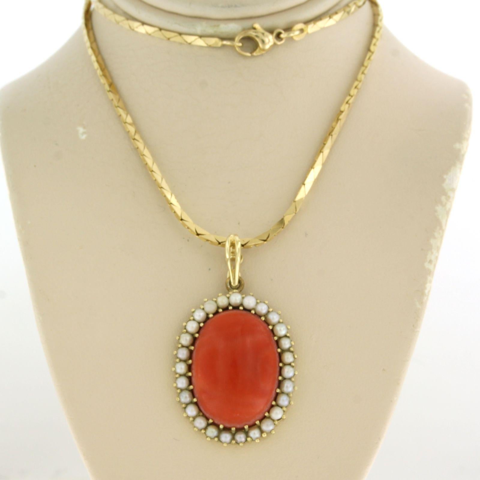 14k yellow gold necklace with pendant set with Corallium Rubrumen and pearls - 20.5 grams - 42 cm long

detailed description

the pendant is 4.1 cm high and 2.4 cm wide

the necklace is 60 cm long and 1.6 mm wide

total weight: 20.5 grams

occupied