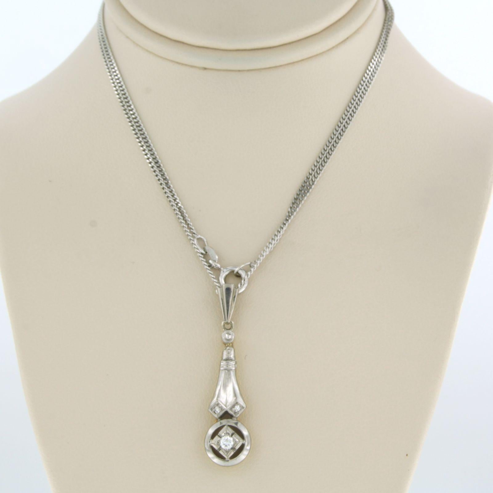 14k white gold necklace with a bicolor gold pendant set with single cut and brilliant cut diamond up to 0.07ct - F/G - VS/SI - 45 cm long

detailed description

the necklace is 45 cm long and 1.2 mm wide

size of the pendant is 3.2 cm long by 8.4 mm