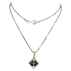 Collana e pendente con smeraldo e diamanti taglio singolo fino a 0,10 carati in oro 18k