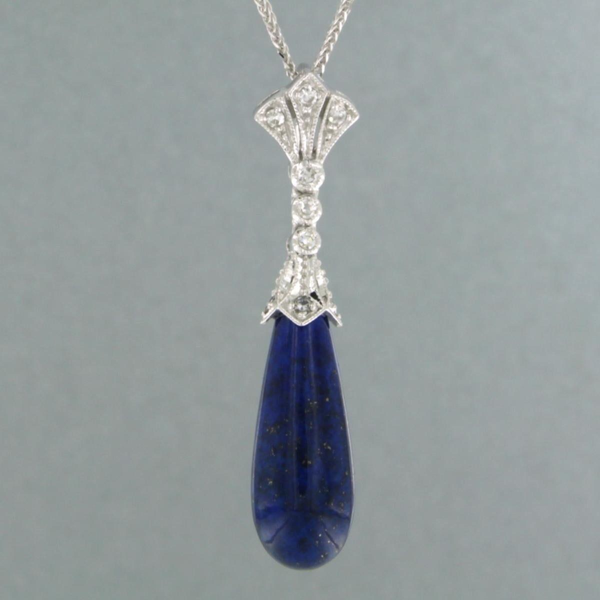 14k white gold necklace with pendant set with lapis lazuli and single cut diamonds. 0.26ct - F/G - VS/SI - 45 cm long

Detailed description

necklace is 45 cm long and 0.7 mm wide

size of the pendant is approximately 4.0 cm long by 8.3 mm