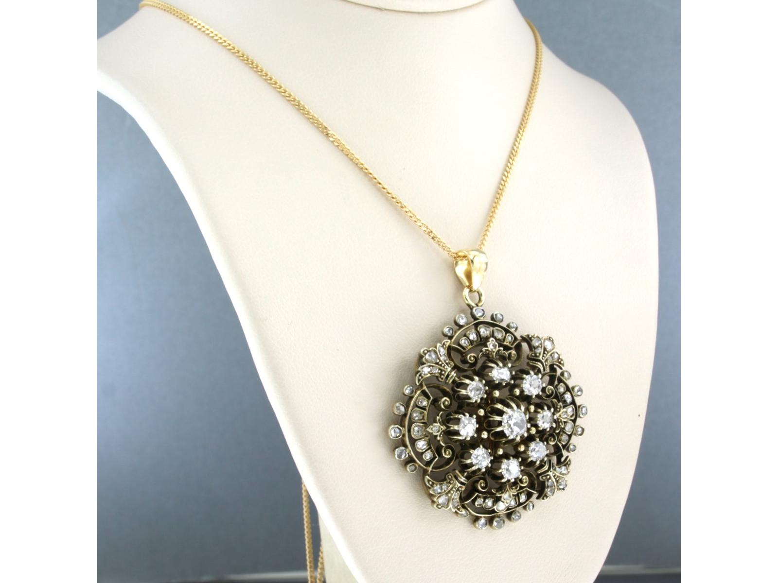 Collana in oro giallo 14k con pendente in oro con diamanti taglio Bolscevico e rosa. 2,20ct - F/G - VS/SI - 50 cm di lunghezza

descrizione dettagliata:

la lunghezza della collana è di 50 cm di lunghezza per 1,1 mm di larghezza

le dimensioni del