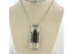 Necklace and pendant with onyx and single cut diamonds up to 1.00ct platinum