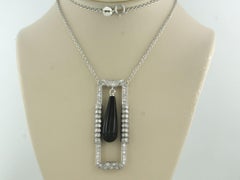 Necklace and pendant with onyx and single cut diamonds up to 1.00ct platinum