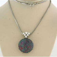 Necklace and pendant with opal and brilliant cut diamonds up to 0.40ct 14k gold